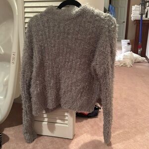 Candie’s gray sweater. Size M.